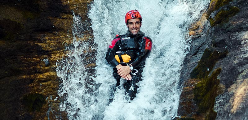 Canyoning in Valsesia. Slide on the Sorba Canyon in Rassa.
